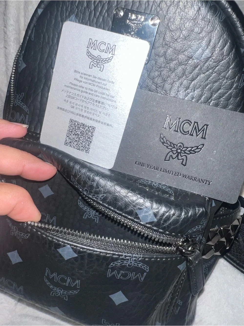MCM coated canvas small stark side studs backpack (has authenticity paper)